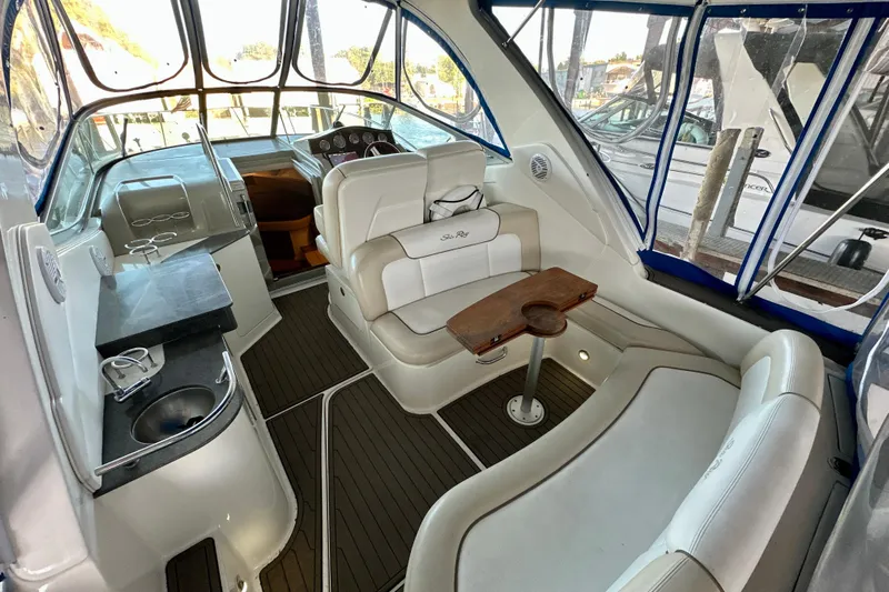  Yacht Photos Pics Interior of 2012 Sea Ray 330 Sundancer yacht with seating and helm.