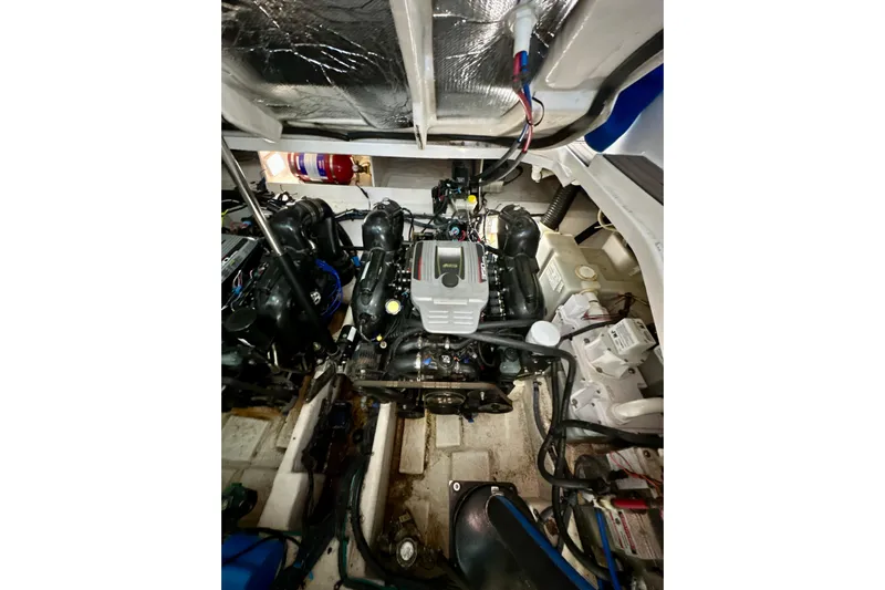  Yacht Photos Pics Engine compartment of 2012 Sea Ray 330 Sundancer, showcasing detailed mechanical components.