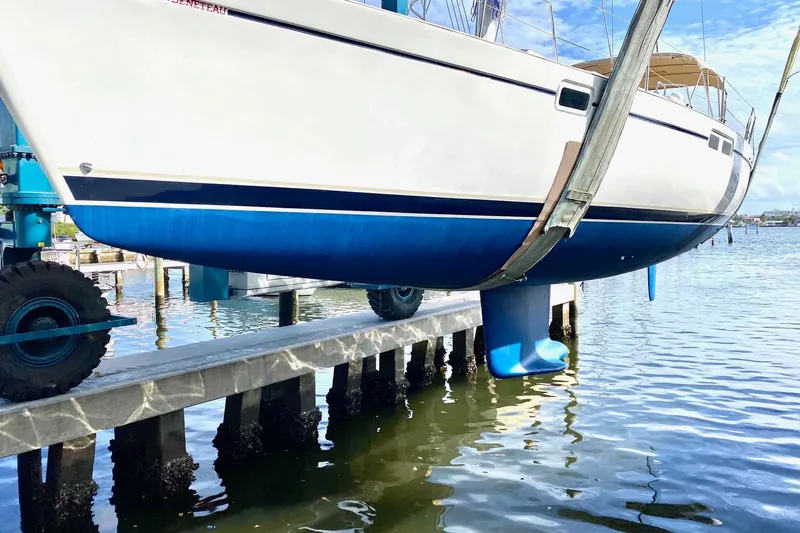 Aundrea Lynn Yacht Photos Pics Beneteau Oceanis 461 sailboat from 1997 being lifted from the water.