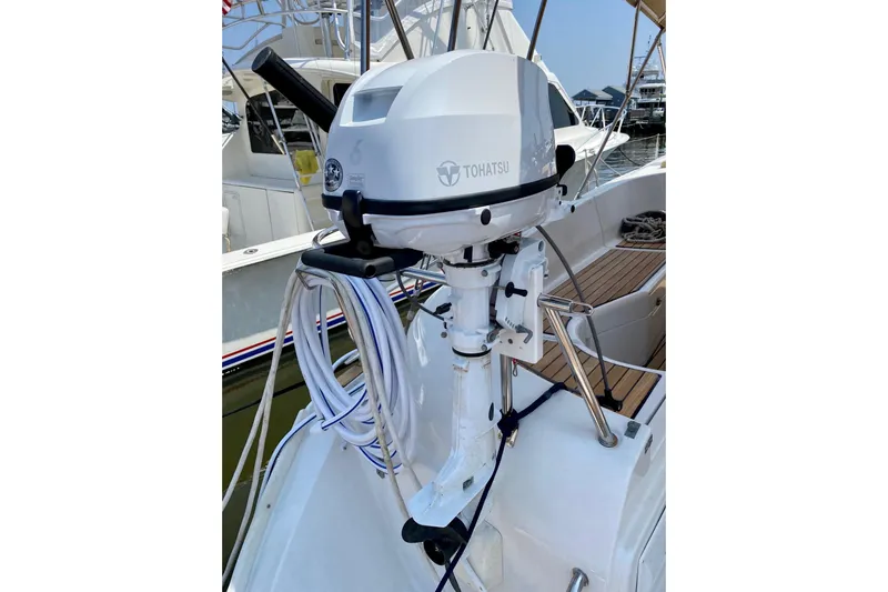 Aundrea Lynn Yacht Photos Pics Tohatsu outboard motor on 1997 Beneteau Oceanis 461 sailboat, docked at marina.