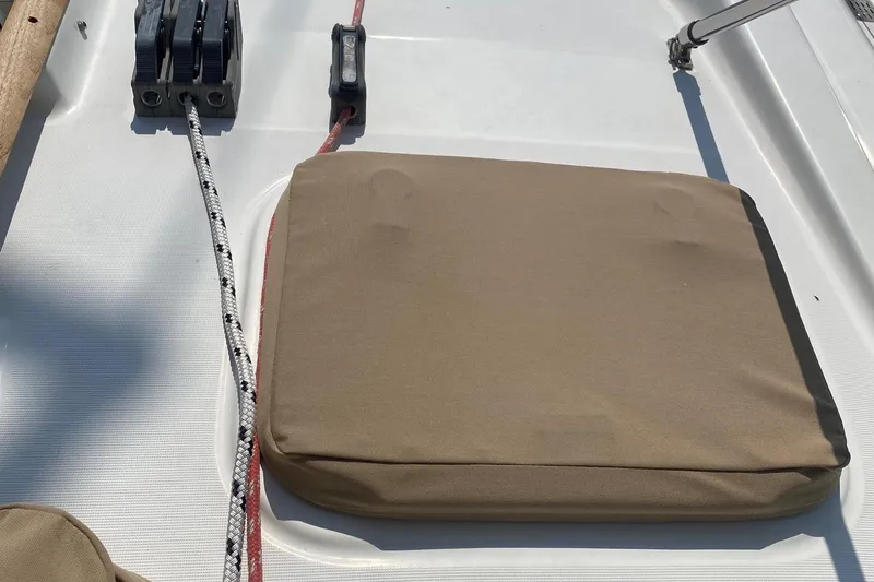 Aundrea Lynn Yacht Photos Pics Deck of 1997 Beneteau Oceanis 461 sailboat with cushion and rigging ropes.