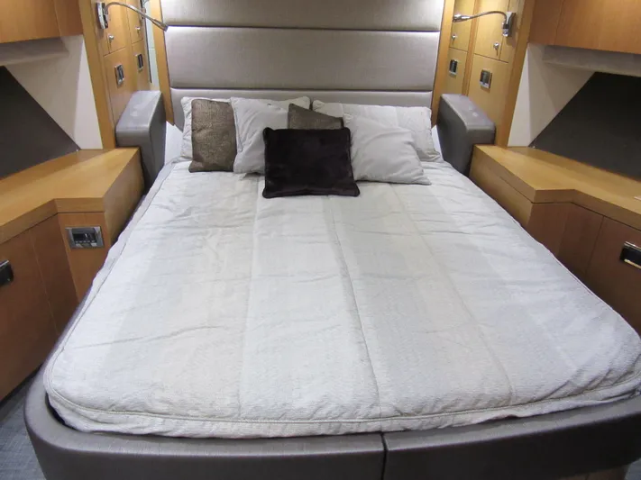 Skeis The Limit Yacht Photos Pics Luxurious bedroom interior of 2014 Sunseeker Manhattan 53 yacht with modern bedding.