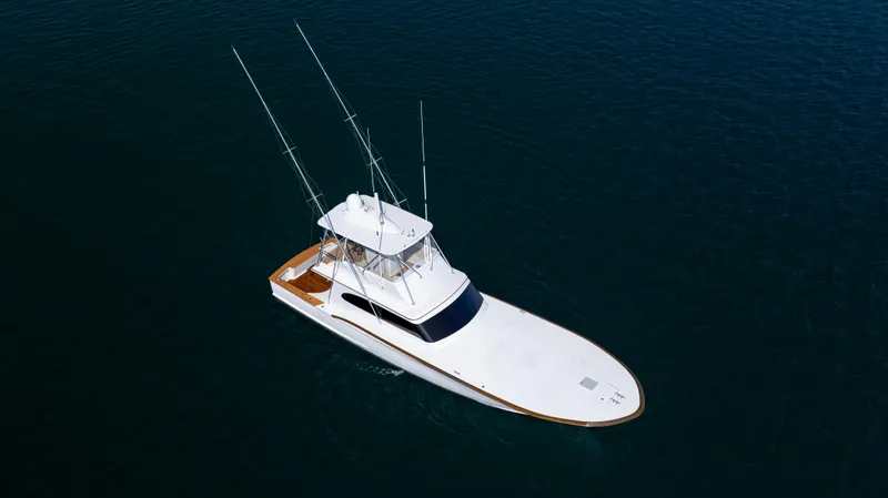 Double B Yacht Photos Pics Aerial view of 2000 Custom Carolina Taylor Made boat on calm water.