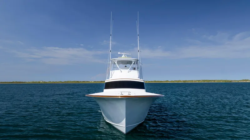 Double B Yacht Photos Pics Front view of 2000 Custom Carolina Taylor Made boat on open water.