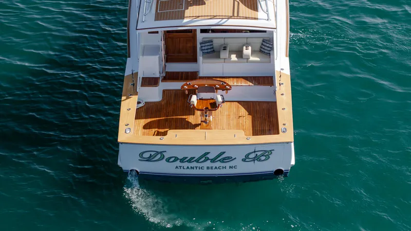 Double B Yacht Photos Pics Custom Carolina Taylor Made 2000 yacht "Double B" on clear blue water, Atlantic Beach, NC.