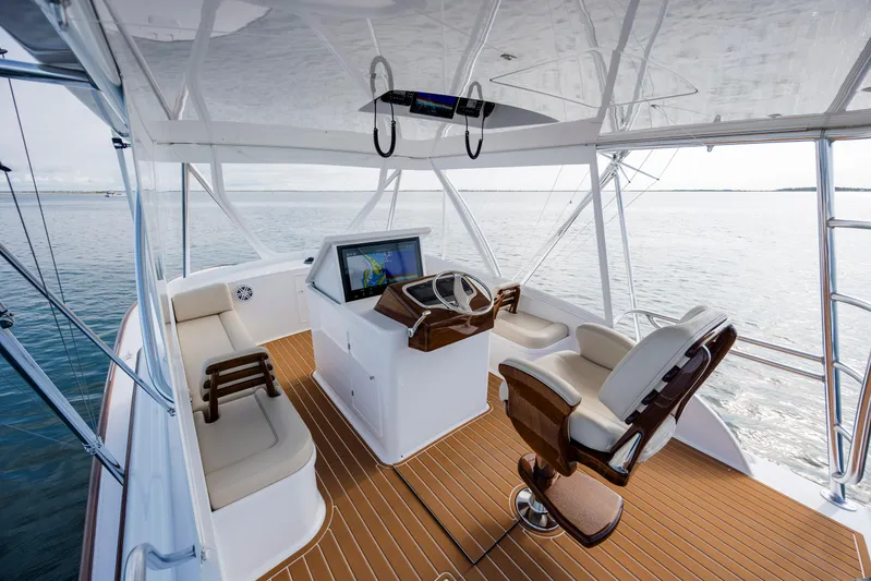 Double B Yacht Photos Pics Luxurious 2000 Custom Carolina Taylor Made yacht interior with modern helm and seating.