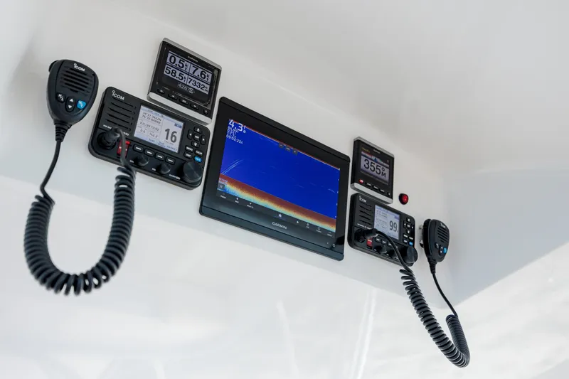 Double B Yacht Photos Pics Boat navigation equipment on Custom Carolina Taylor Made, 2000 model, featuring radios and display screens.