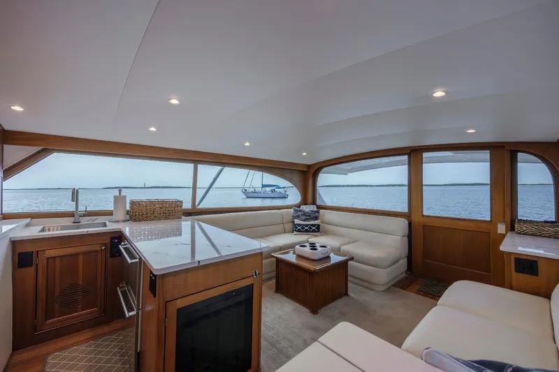 Double B Yacht Photos Pics Luxurious interior of 2000 Custom Carolina Taylor Made yacht with ocean view.