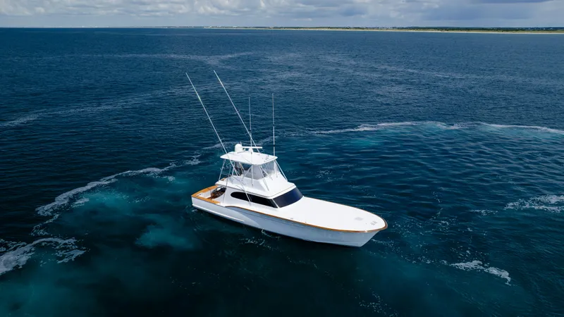 Double B Yacht Photos Pics Custom Carolina Taylor Made 2000 yacht cruising on open ocean waters.