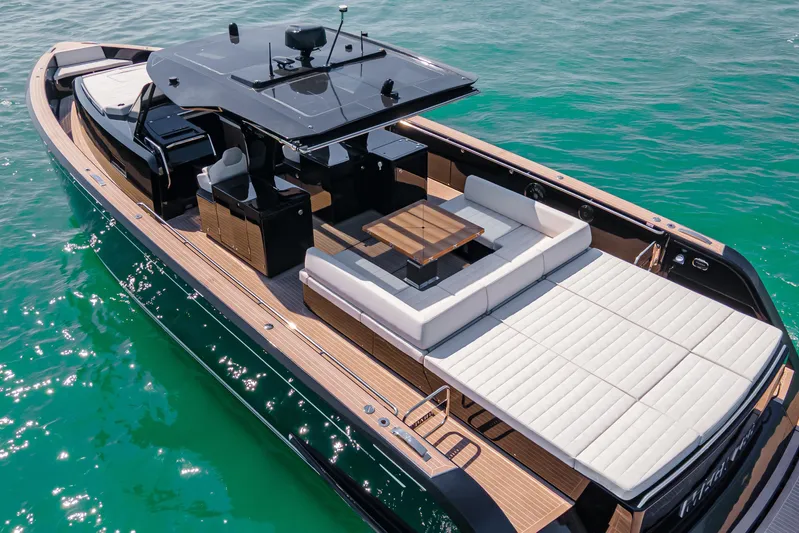  Yacht Photos Pics 2024 Pardo Yachts P50 luxury yacht with spacious deck and elegant seating on turquoise water.