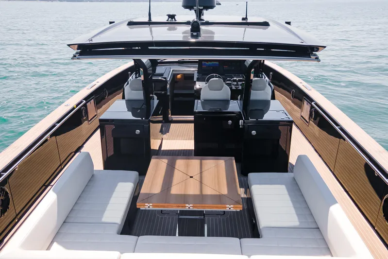  Yacht Photos Pics 2024 Pardo Yachts P50 luxury yacht interior with seating and table on open water.