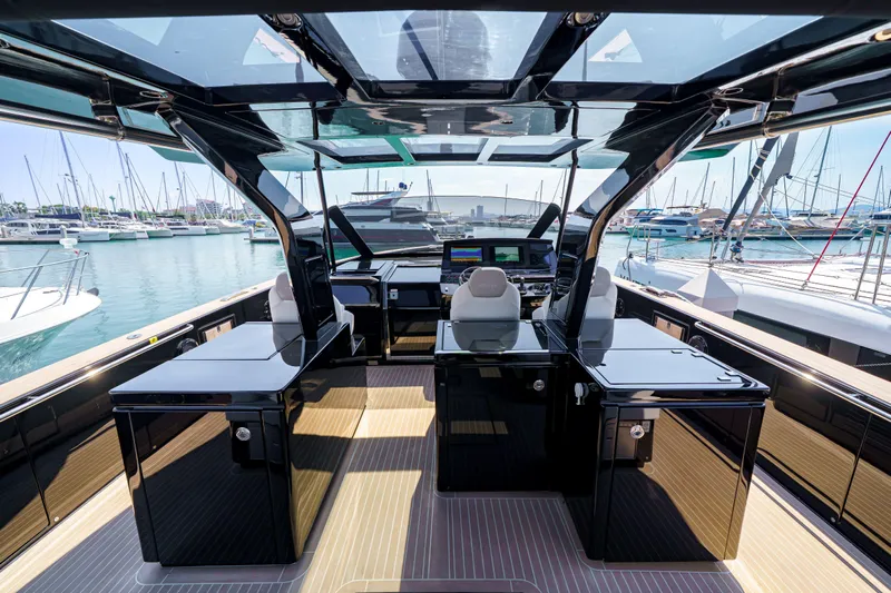  Yacht Photos Pics Luxurious 2024 Pardo Yachts P50 interior with sleek design and marina view.