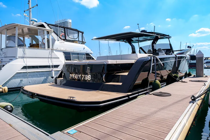  Yacht Photos Pics 2024 Pardo Yachts P50 docked at marina under clear blue sky.