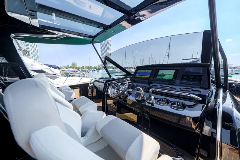  Yacht Photos Pics 2024 Pardo Yachts P50 cockpit with modern controls and luxurious seating.