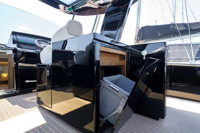  Yacht Photos Pics 2024 Pardo Yachts P50 interior with sleek black cabinetry and modern amenities.