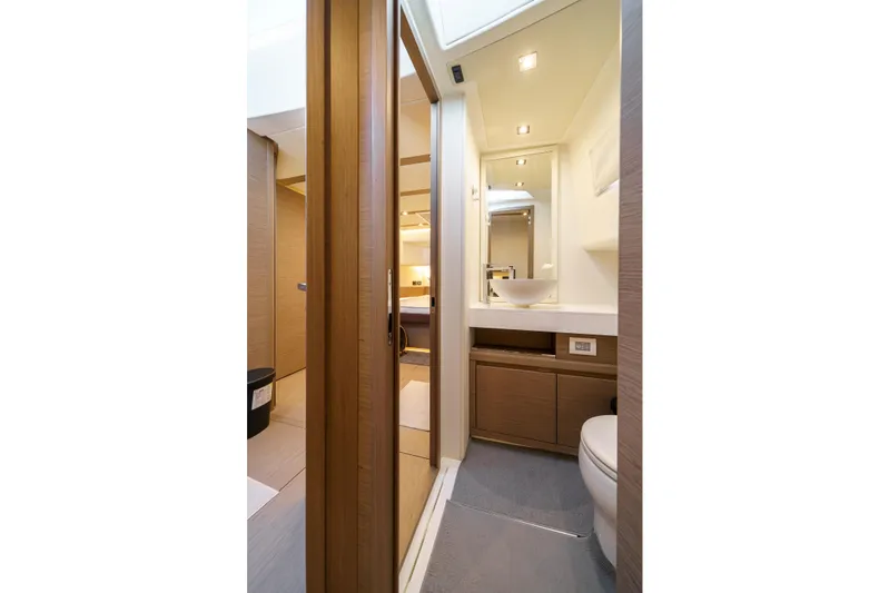  Yacht Photos Pics Luxurious bathroom interior of 2024 Pardo Yachts P50, featuring modern design and wood accents.