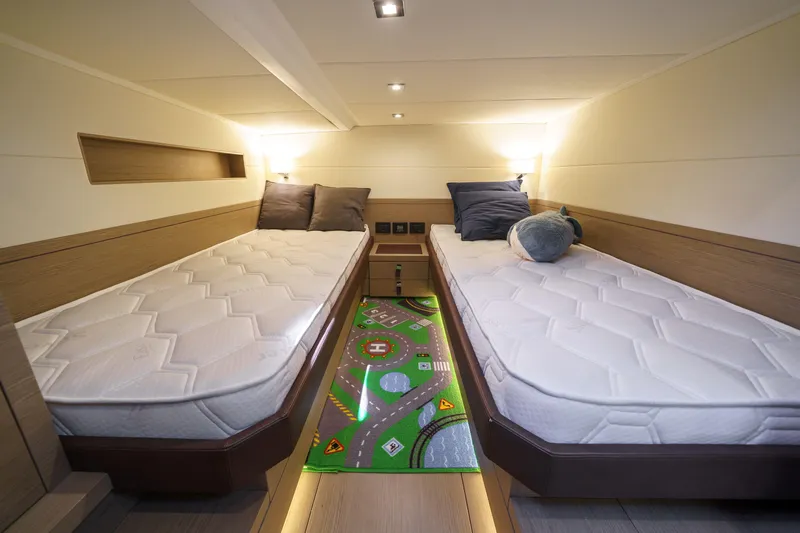  Yacht Photos Pics 2024 Pardo Yachts P50 cabin with twin beds and modern lighting.