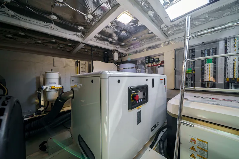  Yacht Photos Pics Engine room of 2024 Pardo Yachts P50, featuring Kohler generator and control panels.