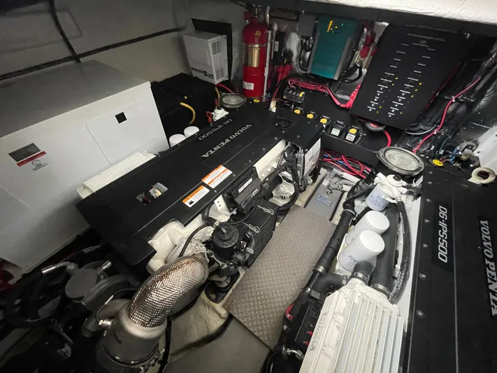 About Time Yacht Photos Pics Engine room of 2022 Regal 42 Grande Coupe with Volvo Penta engines and electrical systems.