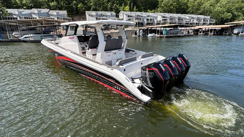  Yacht Photos Pics 2024 Fountain 43 SCX boat with quad engines on a scenic lake.