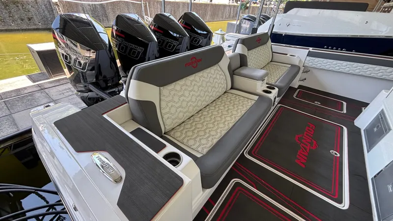  Yacht Photos Pics 2024 Fountain 43 SCX boat interior with luxurious seating and powerful outboard engines.