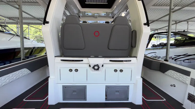  Yacht Photos Pics 2024 Fountain 43 SCX boat interior with modern seating and storage compartments.