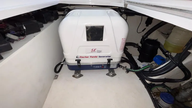  Yacht Photos Pics Fischer Panda generator in 2024 Fountain 43 SCX boat engine compartment.