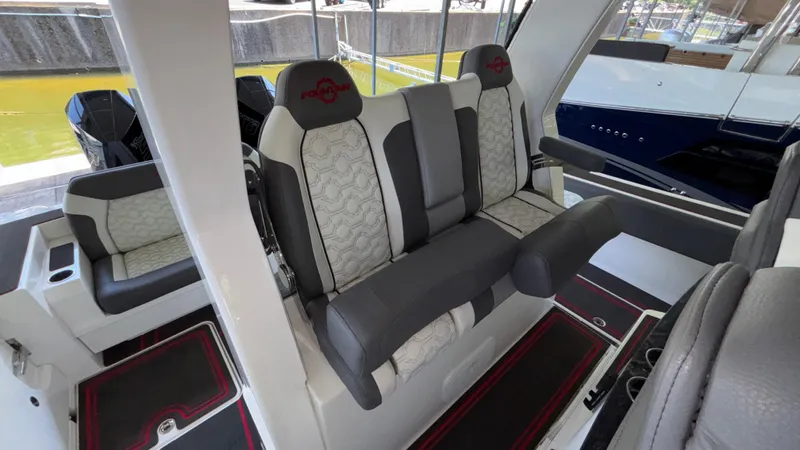  Yacht Photos Pics 2024 Fountain 43 SCX boat interior with luxurious seating and modern design.