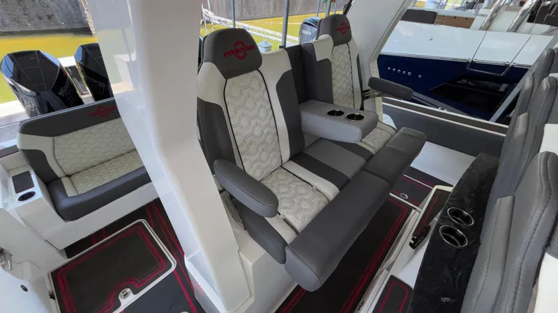  Yacht Photos Pics 2024 Fountain 43 SCX boat interior with luxurious seating and modern design.