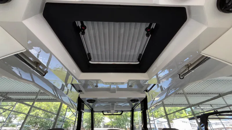  Yacht Photos Pics 2024 Fountain 43 SCX boat interior with sunroof and sleek design.