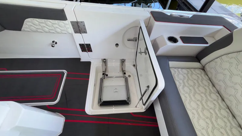  Yacht Photos Pics 2024 Fountain 43 SCX boat interior with open hatch and stylish seating.