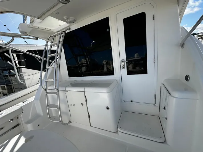  Yacht Photos Pics 2006 Tiara Yachts 3900 Convertible, white exterior with ladder and door.