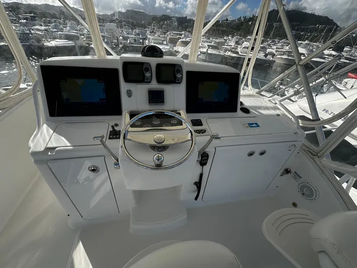  Yacht Photos Pics 2006 Tiara Yachts 3900 Convertible helm with advanced navigation systems and steering wheel.