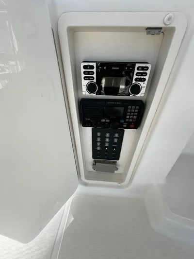  Yacht Photos Pics Control panel on 2006 Tiara Yachts 3900 Convertible, featuring stereo and communication systems.