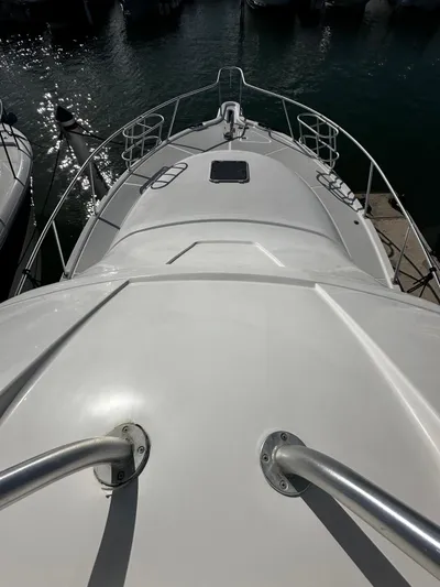  Yacht Photos Pics 2006 Tiara Yachts 3900 Convertible boat deck view at marina.