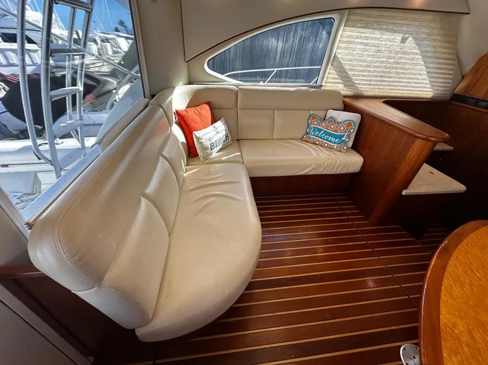  Yacht Photos Pics Interior of 2006 Tiara Yachts 3900 Convertible with leather seating and decorative pillows.