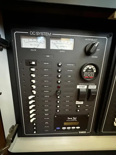  Yacht Photos Pics Control panel of a 2006 Tiara Yachts 3900 Convertible, featuring DC system and Sea Tel controls.