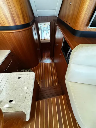  Yacht Photos Pics Interior of 2006 Tiara Yachts 3900 Convertible with wood finish and modern amenities.