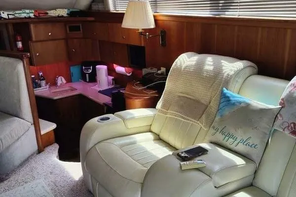  Yacht Photos Pics Luxurious interior of a 2001 Silverton 42 Convertible yacht with plush seating.