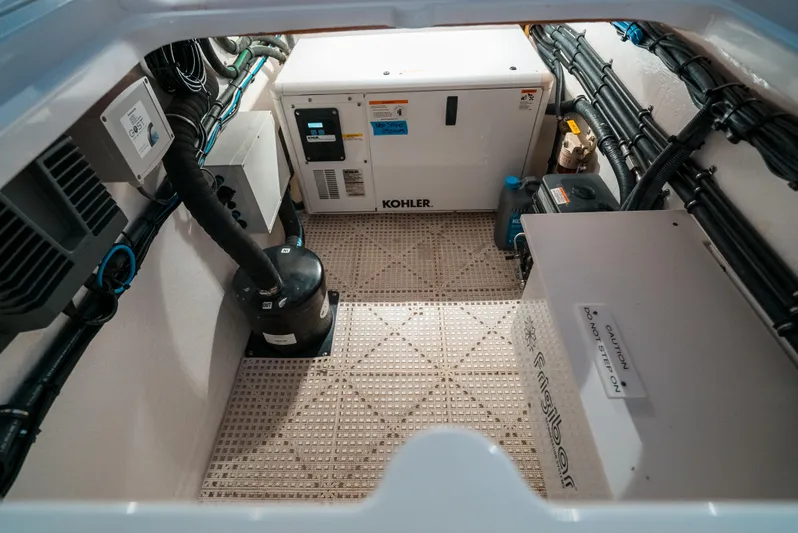 Yacht Photos Pics Engine room of 2021 Intrepid 409 Valor with Kohler generator and organized wiring.