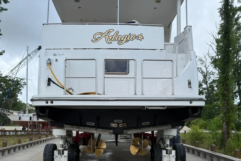 Adagio Yacht Photos Pics 2005 Jefferson Rivanna 50 SDMY yacht on dry dock, rear view with "Adagio" name.