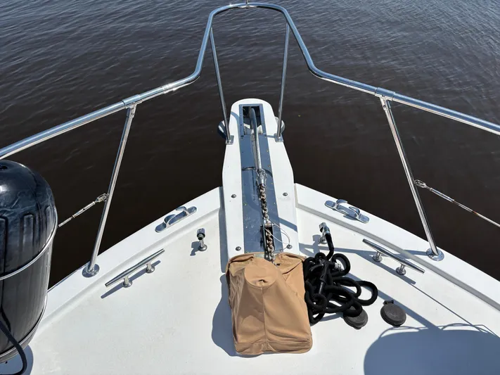 Adagio Yacht Photos Pics Bow of 2005 Jefferson Rivanna 50 SDMY yacht with anchor and ropes.