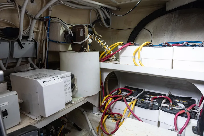  Yacht Photos Pics Engine room of a 2008 Marquis 50 LS yacht with electrical components and wiring.