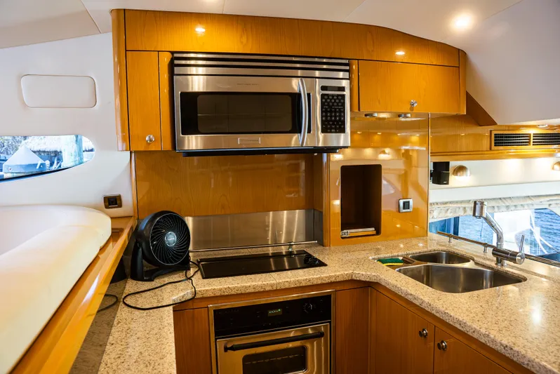  Yacht Photos Pics Luxurious kitchen interior of 2008 Marquis 50 LS yacht with modern appliances.