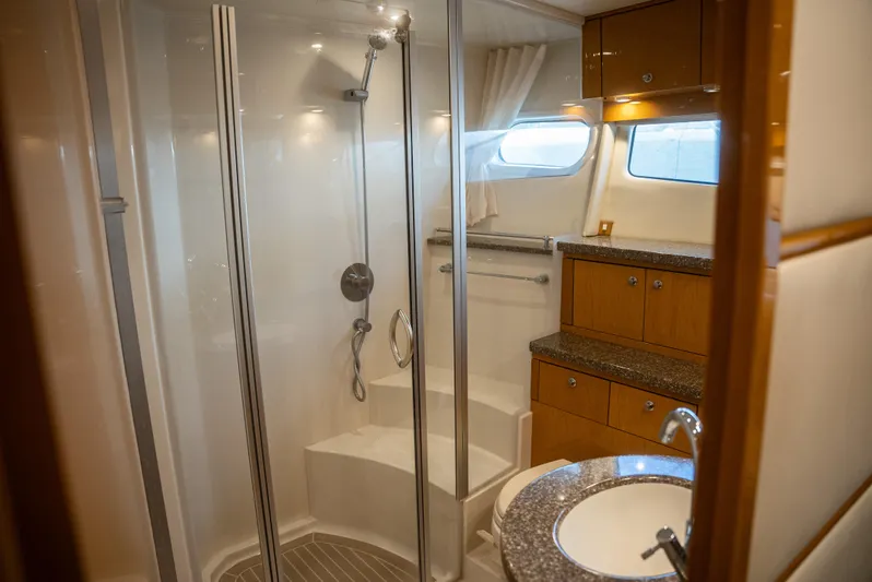  Yacht Photos Pics Luxurious bathroom in 2008 Marquis 50 LS yacht with shower and vanity.