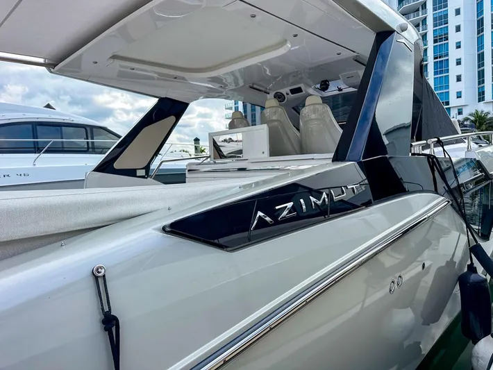  Yacht Photos Pics 2023 Azimut Verve 47 luxury yacht docked, showcasing sleek design and modern features.
