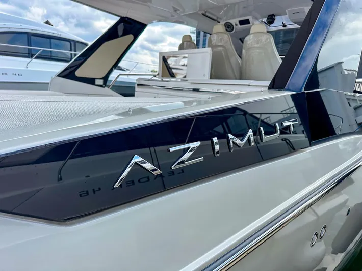  Yacht Photos Pics 2023 Azimut Verve 47 luxury yacht, sleek design, close-up view.