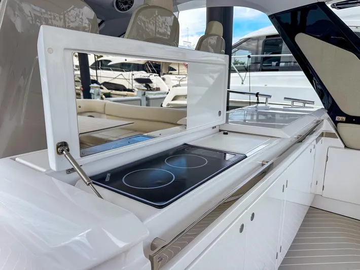  Yacht Photos Pics 2023 Azimut Verve 47 yacht kitchen with modern stovetop and sleek design.