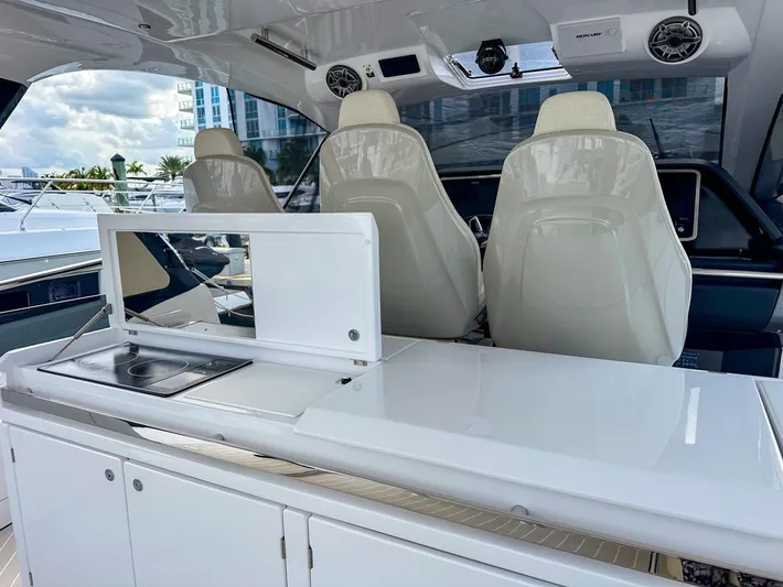  Yacht Photos Pics 2023 Azimut Verve 47 yacht interior with sleek seating and modern amenities.