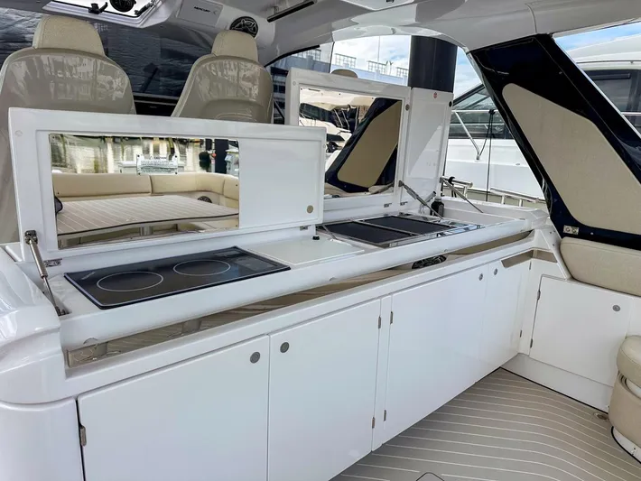  Yacht Photos Pics 2023 Azimut Verve 47 yacht interior with modern kitchen amenities.